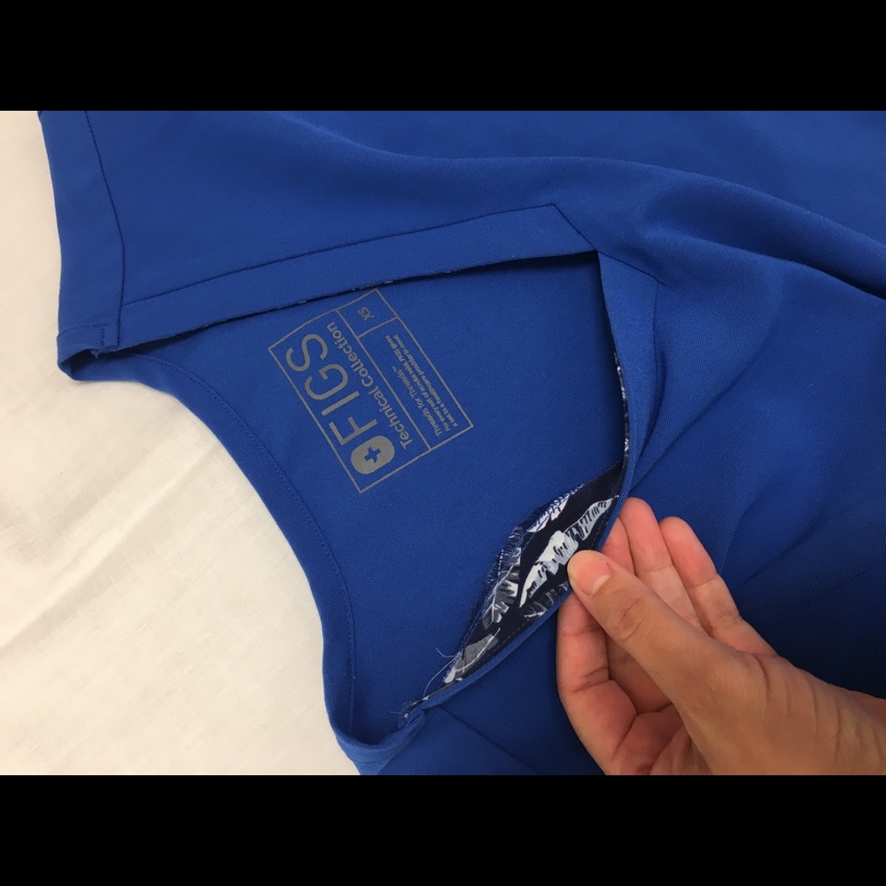 Royal blue Figs set. Xs top and bottom. Used.